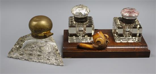 A Meerschaum pipe, a triangular cut glass inkwell and a desk stand fitted two cut glass inkwells